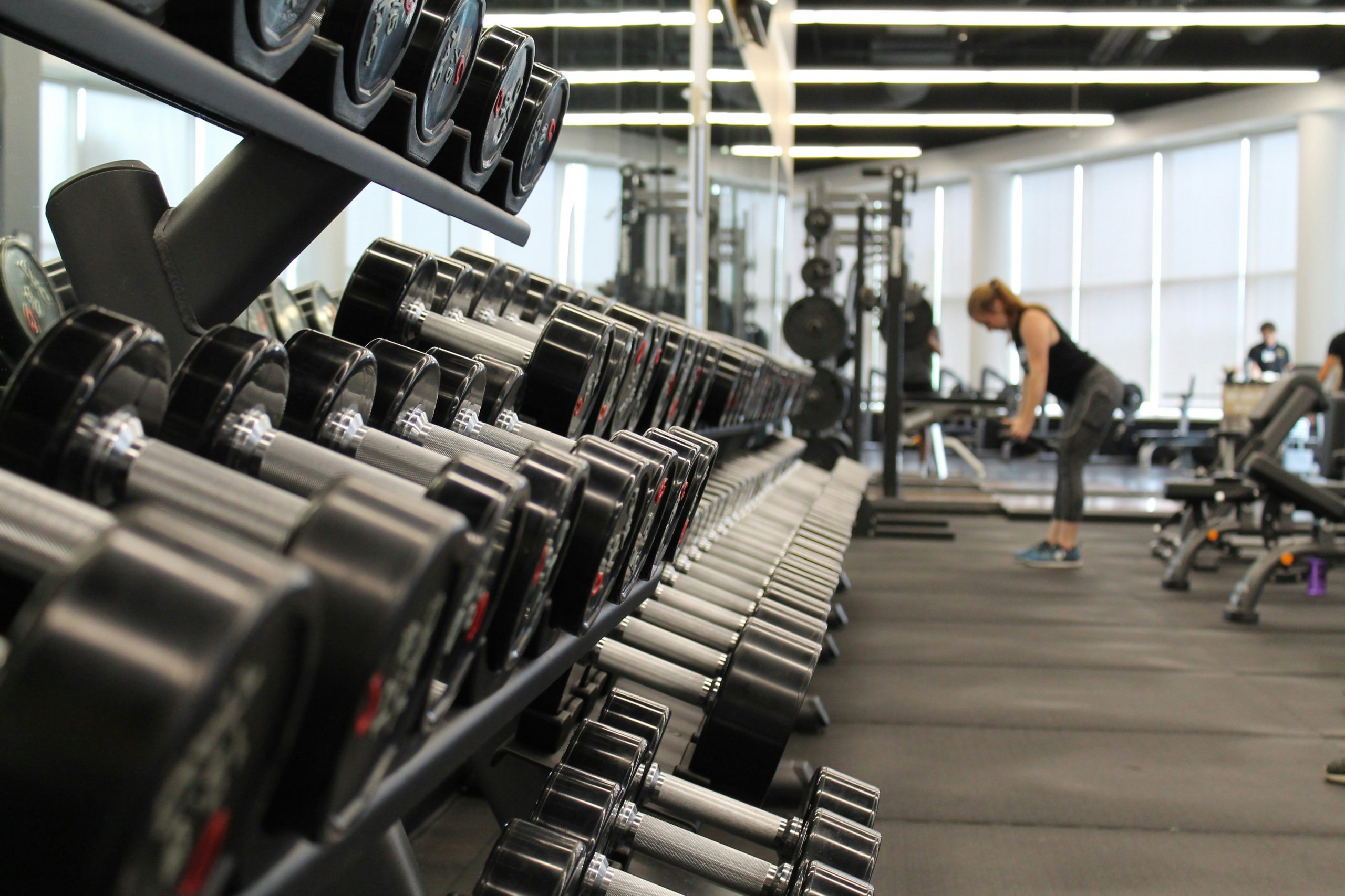 a close-up of dumbbells in a gym